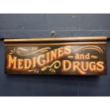 Medicine and Drugs painted wooden advertising board {H 23cm x W 64cm}.