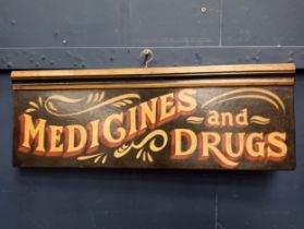 Medicine and Drugs painted wooden advertising board {H 23cm x W 64cm}.