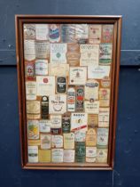 Irish whiskey advertising labels collage print in wooden frame {H 53cm x W 34cm}.