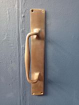 Bronze door handle {H 30cm x W 5cm x D 5cm }.