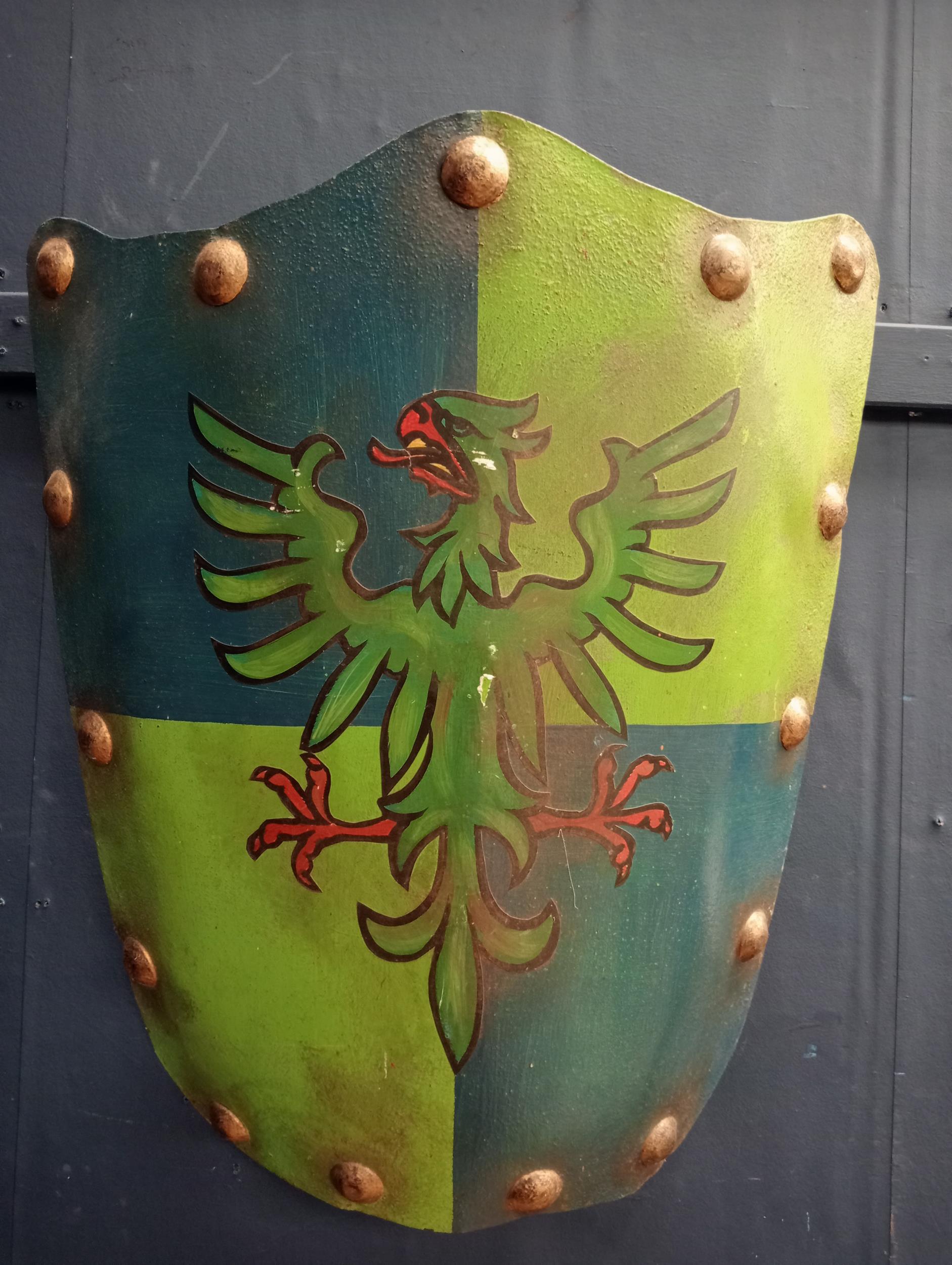 Painted metal shield with Dragon decoration. {H 609cm x W 51cm x D 10cm}.