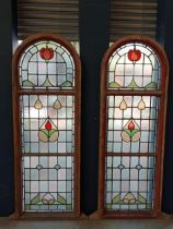 Pair of Victorian reclaimed arch topped stained glass windows. {Each H 191cm x W 67cm x D 9cm}.