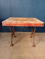 Solid butchers block on cast iron base {H 77cm x W 94cm x D 87cm}.