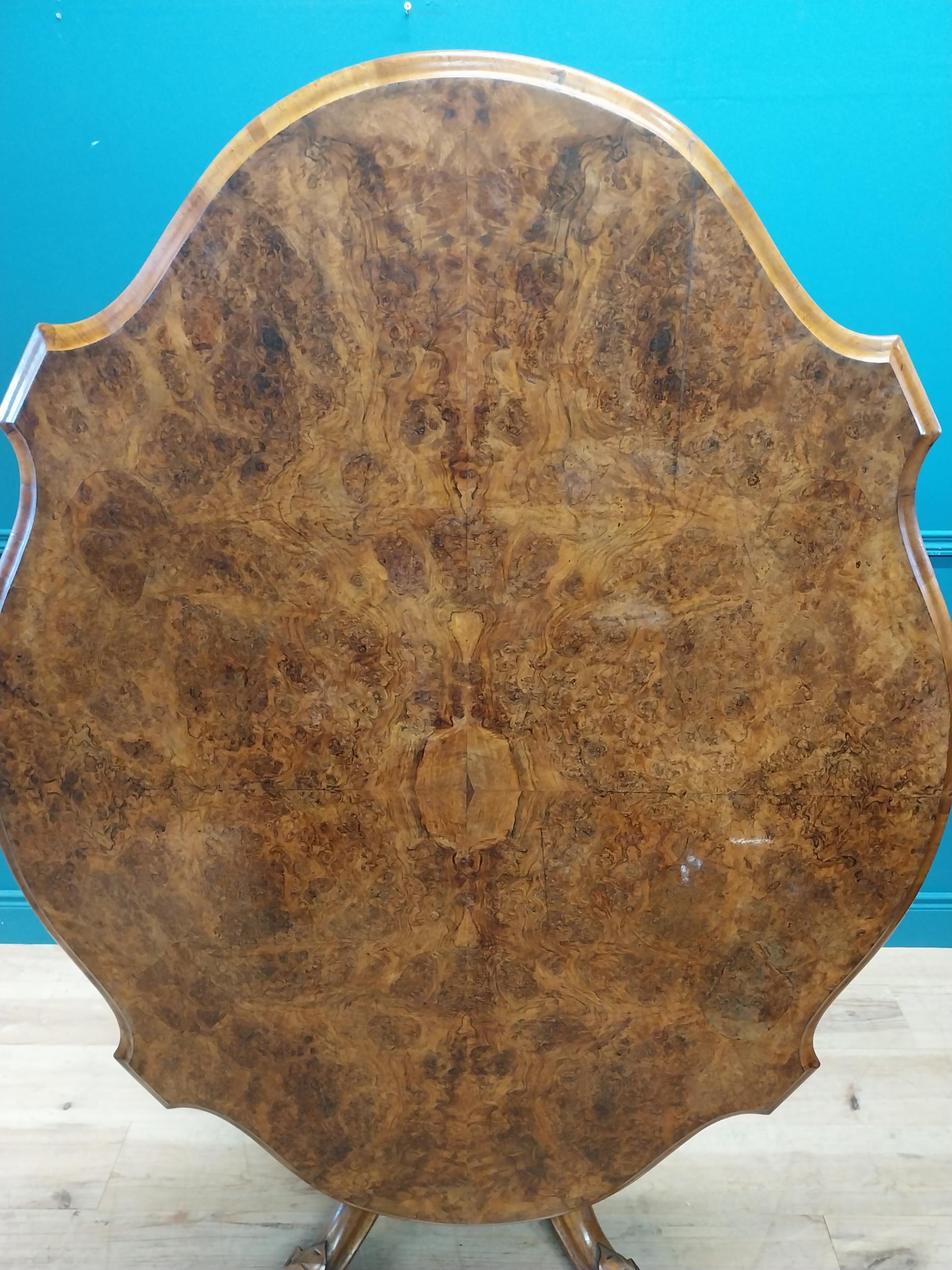 Good quality Victorian burr walnut tilt top centre table raised on turned column and four outswept - Image 5 of 7