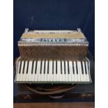 20th C. Italian Caselli piano accordion with case. {H 17cm x w 52cm x D 42cm}.