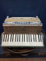 20th C. Italian Caselli piano accordion with case. {H 17cm x w 52cm x D 42cm}.