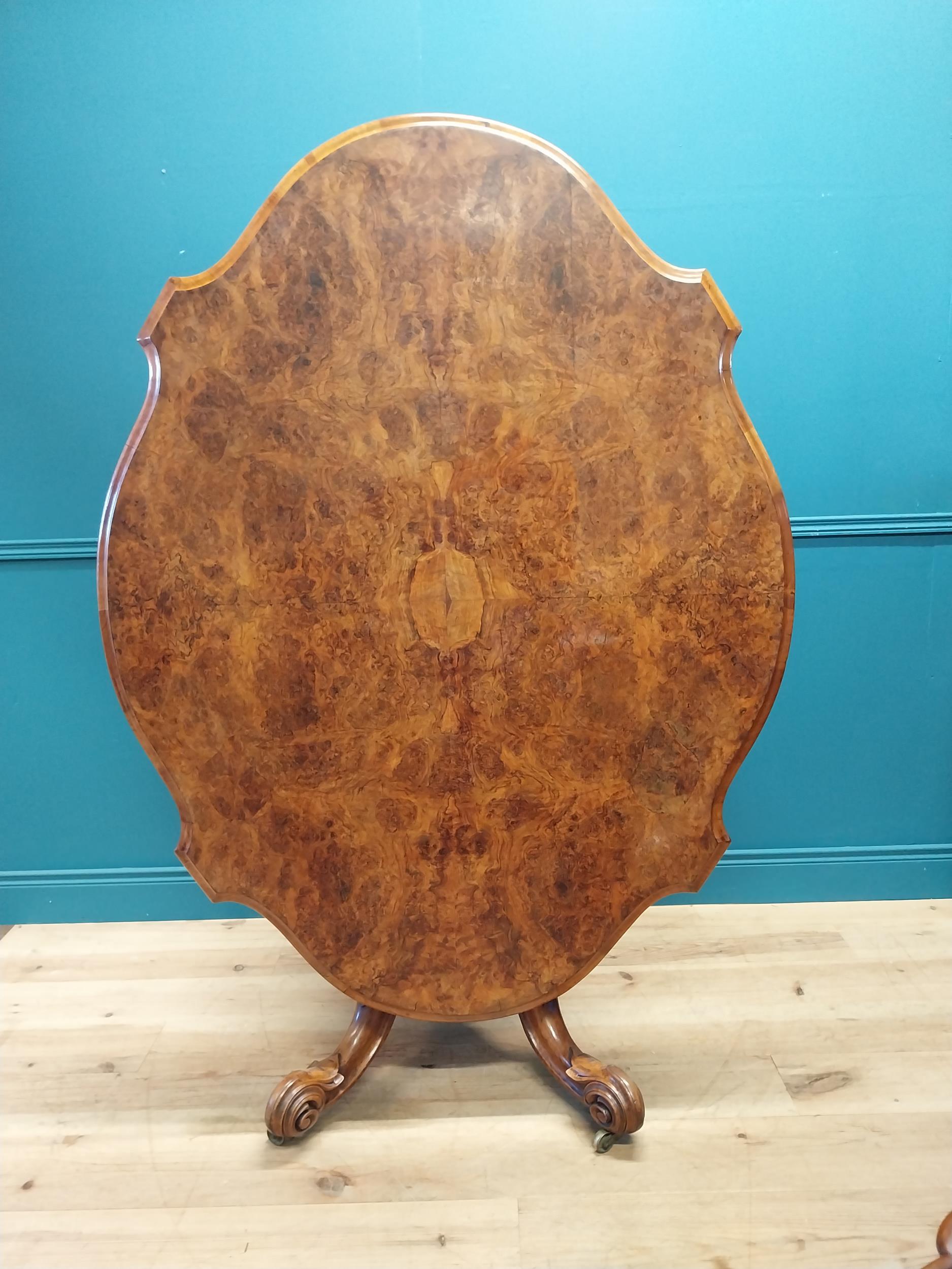 Good quality Victorian burr walnut tilt top centre table raised on turned column and four outswept - Image 4 of 7