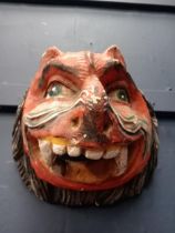 Hand carved wooden lions head mask {H 25cm x W 25cm x D 21cm }.