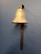 Brass school bell and bracket {H 47cm x W 15cm x D 15cm}.