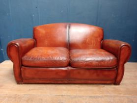 1940's leather two seater club sofa. {H 80cm x W 160cm x D 80cm}.