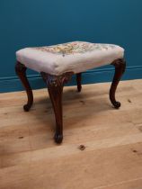 19th Carved oak stool with tapestry upholstered seat raised on cabriole legs {34 cm H x 54 cm W x 46