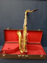 20th C. Brass saxophone in case. {H 64cm x W 16cm x D 38cm }.