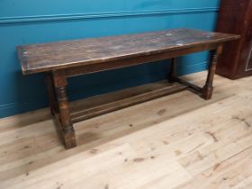 Oak kitchen table raised on turned legs and single stretcher {77cm H x 218cm W x 85cm D} (not