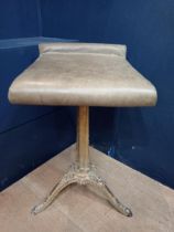 Early 20th C. music stool with leather upholstery on cast iron base. {H 56cm x W 38cm x D 31cm}.