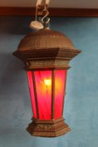 Bronze hanging lantern with red stain glass panels { 75cm x Dia 47cm}.