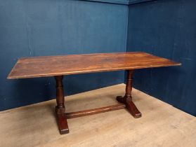 19th C. Oak refectory table on turned columns with single stretcher.