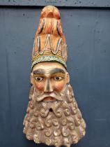 Hand carved wooden mask with beard and snake head {H 80cm x W 45cm x D 20cm }.