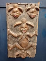 African granary wooden door with carved female figure and heads {H 120cm x W 64cm x D 3cm }.
