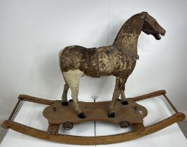 Retro rocking horse with wheels and rocking frame {On rocking frame H 91cm x L 130cm x W 41cm}.