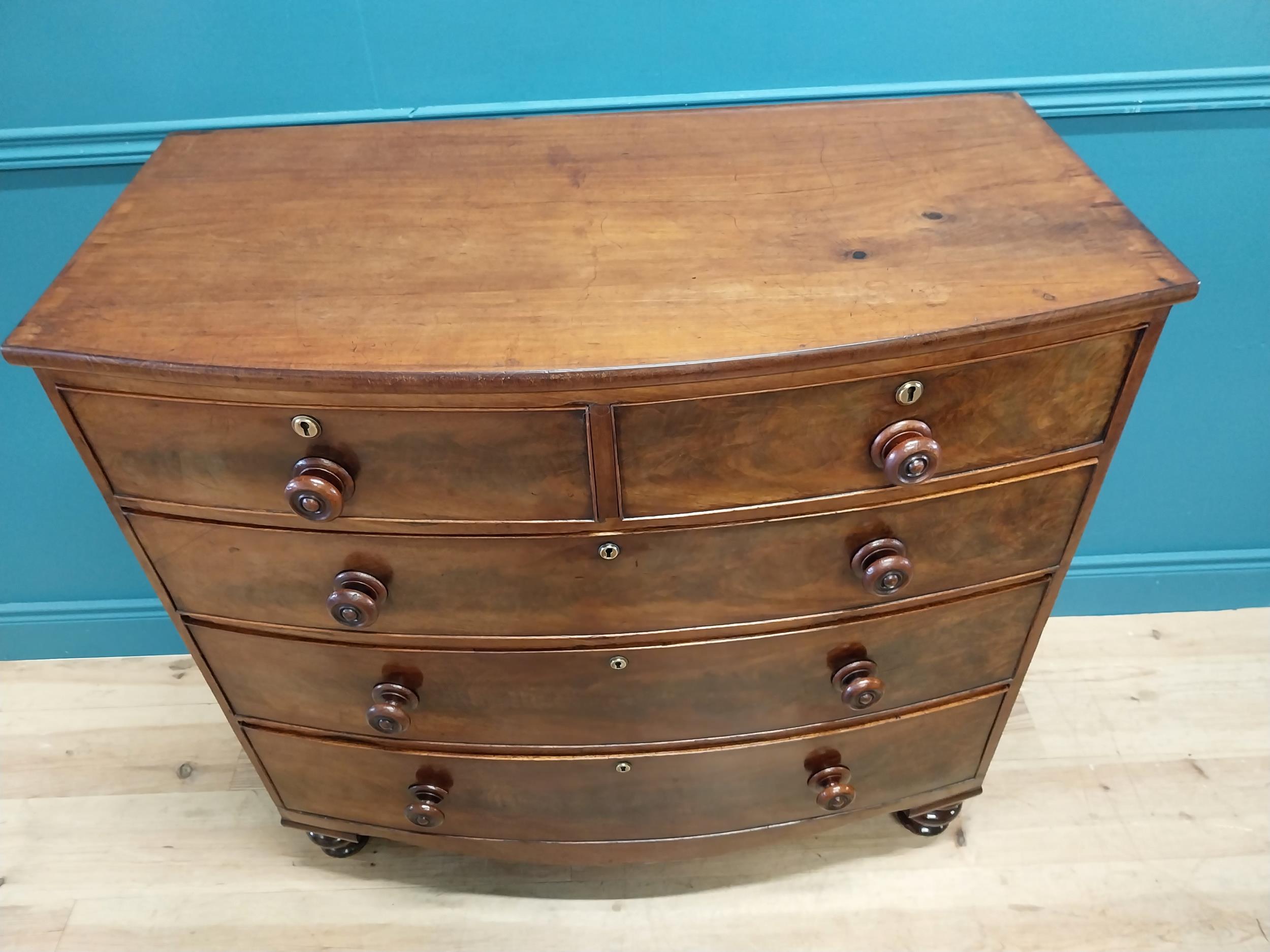 19th C. flamed mahogany bow fronted chest of drawers with two short drawers over three graduated - Image 2 of 7