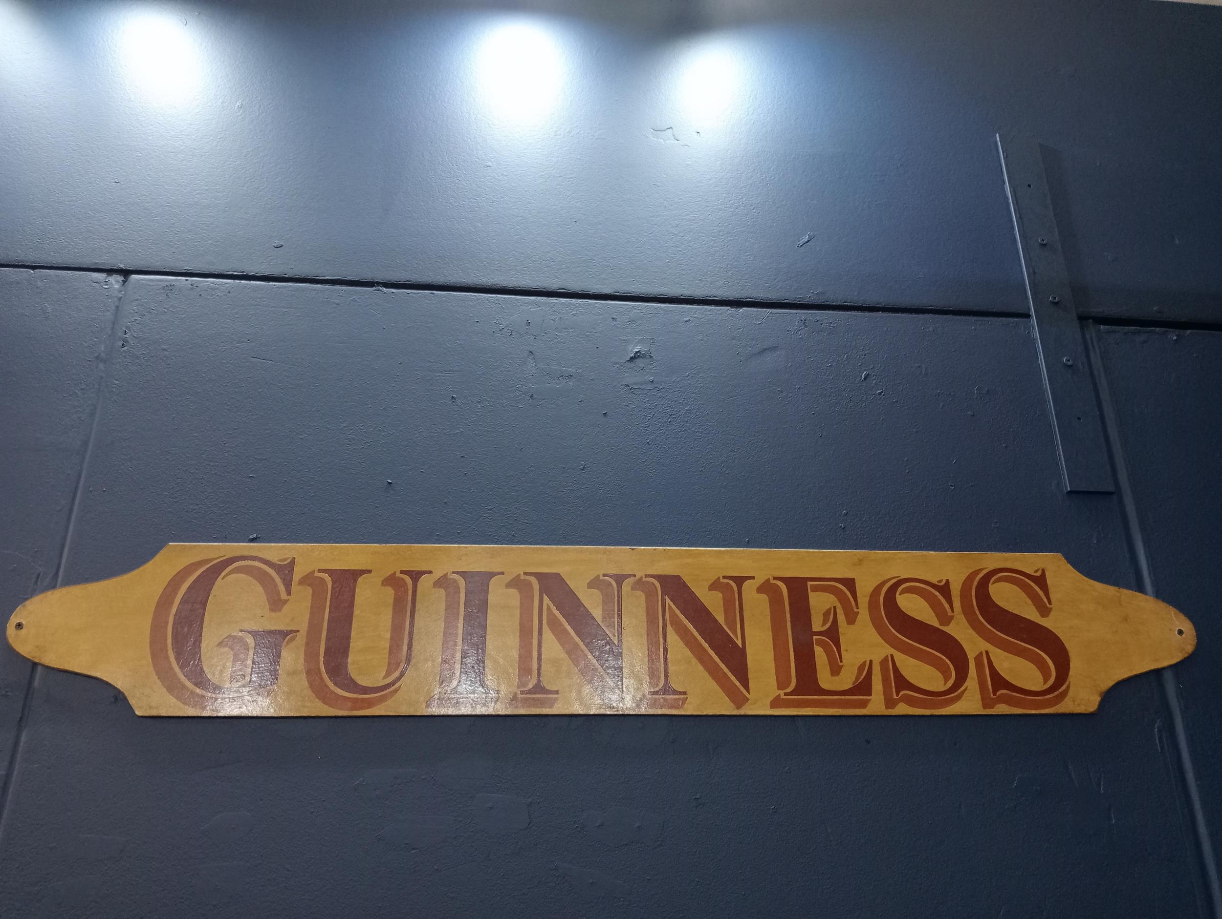 Guinness painted wooden advertising board {H 15cm x W 42cm }.