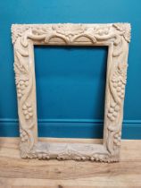 Small highly carved pine picture frame. {76 cm H x 54 cm W x 6 cm D}.