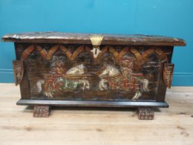 Unusual carved and painted pine trunk with jousting horses and shield decoration in front and side