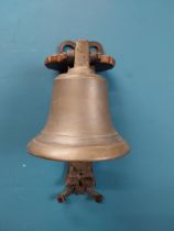 Bronze wall bell with original bracket. {50 cm H x 24 cm W x 30 cm D}.