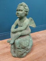 Resin model of Angel seated on rock. {64 cm H x 49 cm W x 49 cm D}.