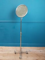 Rare Art Deco chrome shaving mirror on four wheeled stand. {146 cm H x 35 cm x 35 cm D}.