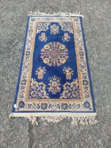 Oriental carpet square. {172 cm H x 84 cm W}.