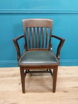 1940's oak desk chair with upholstered leather seat. {90 cm H x 55 cm W x 40 cm D}.
