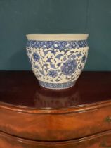 Blue and white Oriental ceramic jardiniere {30 cm H x 36 cm Dia.}.