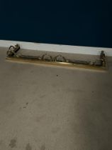 Good quality brass fire fender in the Victorian style {17 cm H x 150 cm W x 40 cm D}.