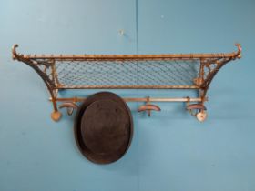 Early 20th C. brass luggage rack with hat and coat rack. {30 cm H x 71 cm W x 35 cm D}.