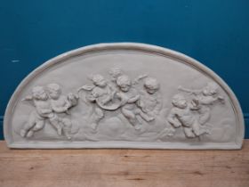 Plaster wall plaque in the Classical style depicting cherubs. {52 cm H x 117 cm W}.