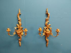 Pair of giltwood wall sconces in the Rococo manner. {64 cm H x 32 cm W x 17 cm W}.