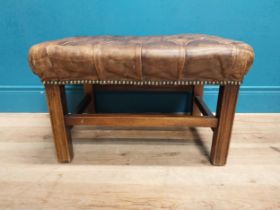 Early 20th C. hand dyed deep buttoned leather stool. {40 cm H x 65 cm W x 49 cm D}.