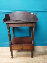 19th C. mahogany washstand with single drawer at bottom on turned legs. {99 cm H x 61 cm W x 47 cm