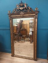 19th C. French gilt mirror surmounted with cherubs, foliage and fruit. {180 cm H x 96 cm W}.