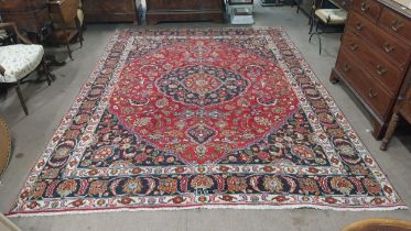 Decorative Persian carpet square {349 cm L x 257 cm W }.