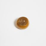 Greco-Persian Agate Intaglio Seal With a Bull, 4th century BC, irregular diameter 1.1 in — 2.9 cm