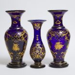 Garniture of Three Continental Gilt Decorated Blue Glass Vases, 19th century, height 15.7 in — 40 cm