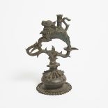 A Bronze Nandi-Form Lamp Stand, Probably Himachal Pradesh, 15th Century or Later, height 7.5 in — 19