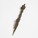A Bronze Phurba Ritual Dagger, Tibet, 14th Century or Later, length 8.9 in — 22.6 cm