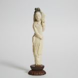 An Ivory Figure of a Female Archer, Early 20th Century, 民国 牙雕女武将摆件, including stand height 9.3 in —