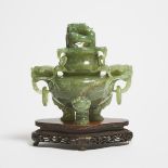 A Serpentine Tripod Censer, Early to Mid 20th Century, 二十世纪中期 岫玉雕活环兽耳三足炉, height 6.3 in — 16 cm