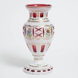 Bohemian Overlaid, Enameled and Gilt Red Glass Vase, 20th century, height 12.2 in — 31 cm