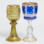 Two Bohemian Cut, Etched and Gilt Coloured Glass Large Goblets, late 19th century, height 12.5 in —