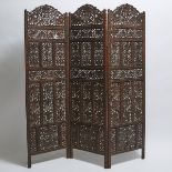 Indian Relief Carved Teak Three-Fold Fretwork 'Angure Ka Parre' Screen, early-mid 20th century, 62.5
